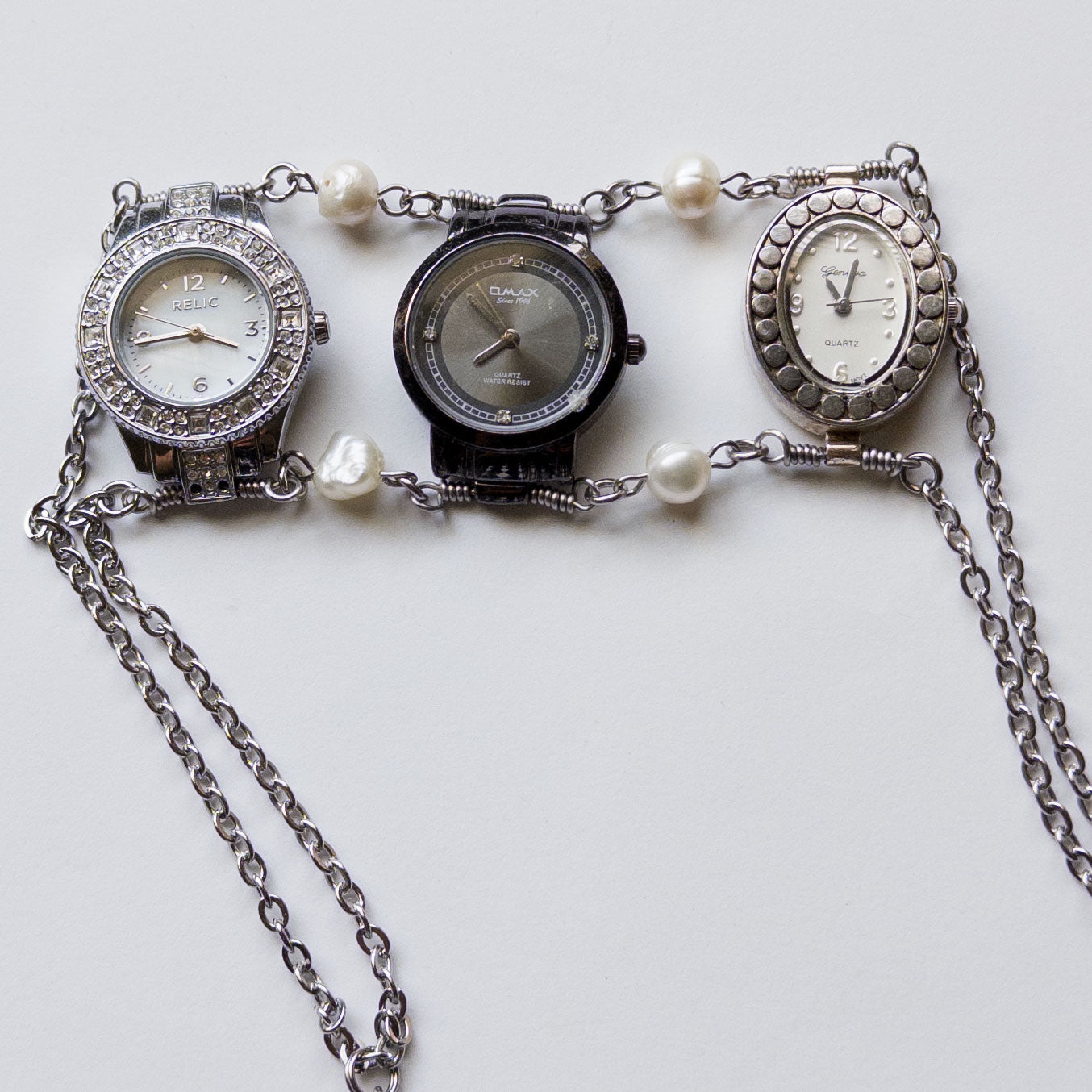 upcycled 3 vintage watch necklace choker stainless steel silver time piece clock classy elegant punk subversive accessories diy avant garde sustainable jewelry fashion futuristic  freshwater pearls dangly black blue