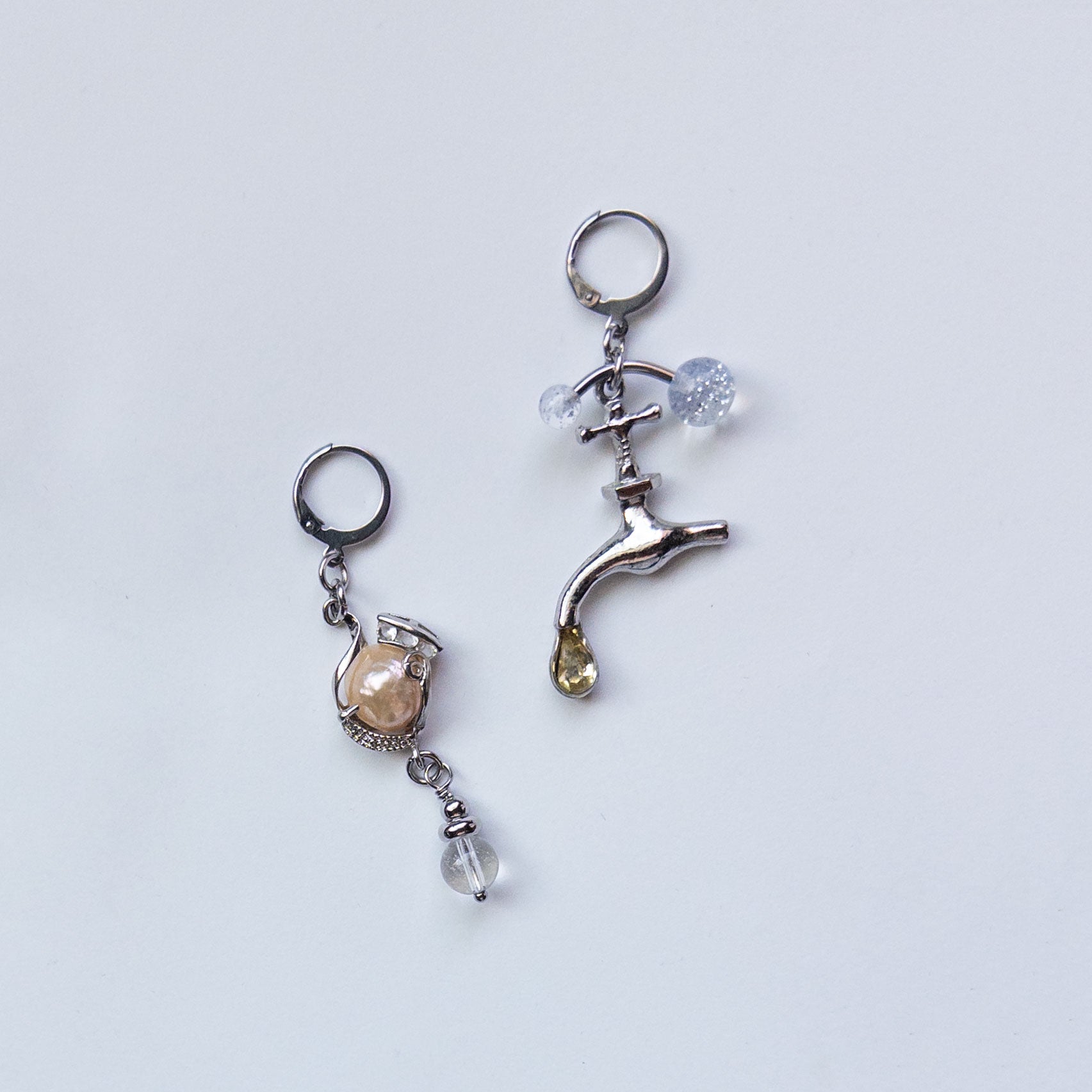 mixed metal earrings with faucet charm and freshwater pearl