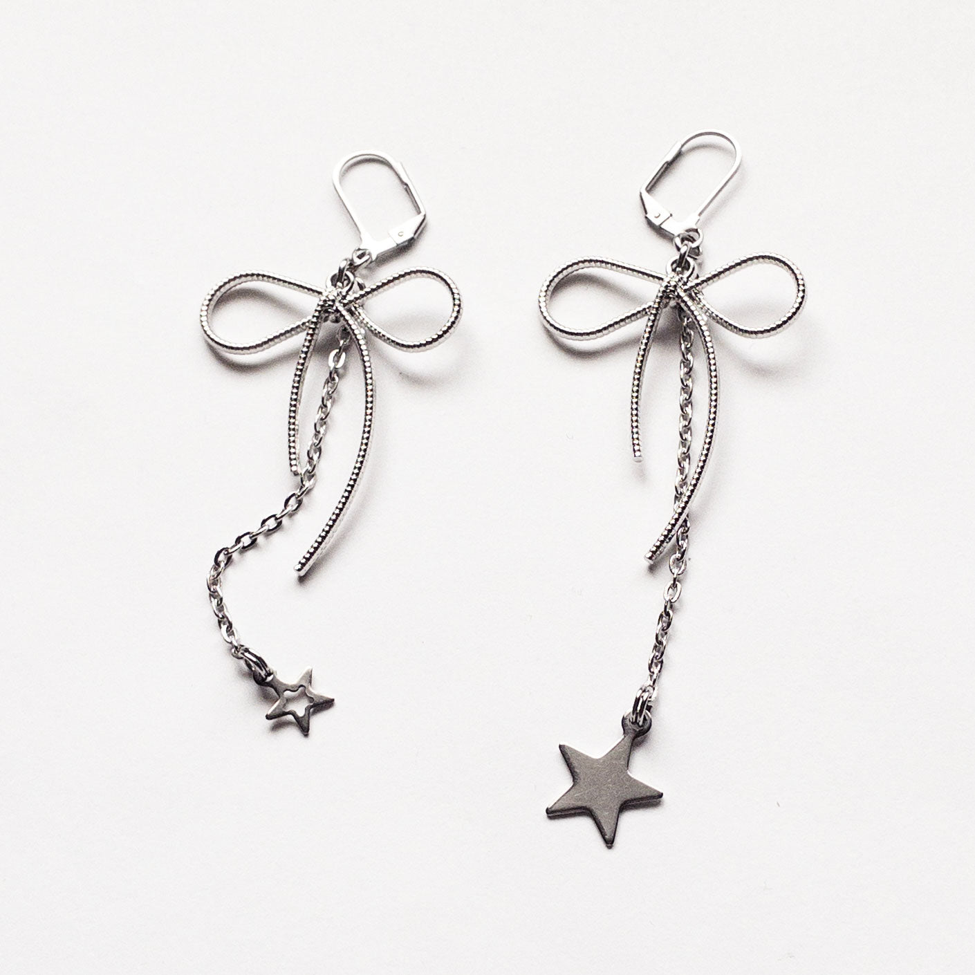 silver bow earrings with hypoallergenic stainless steel hooks