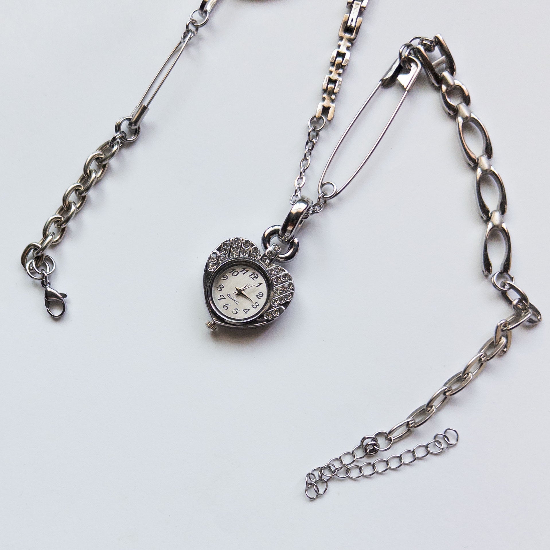 upcycled mixed metal necklace with heart watch pendant