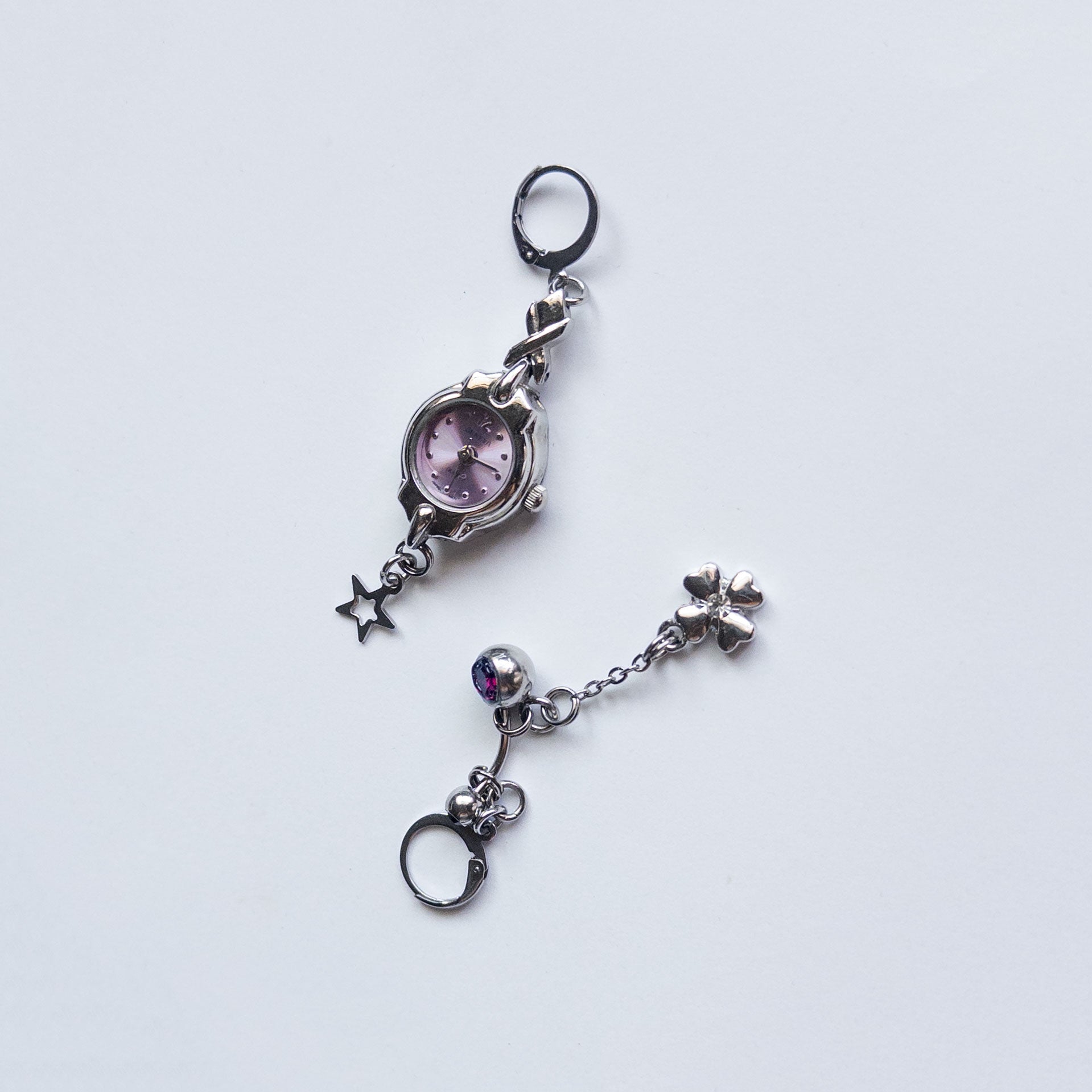 mixed metal earrings with vintage watch and star charms