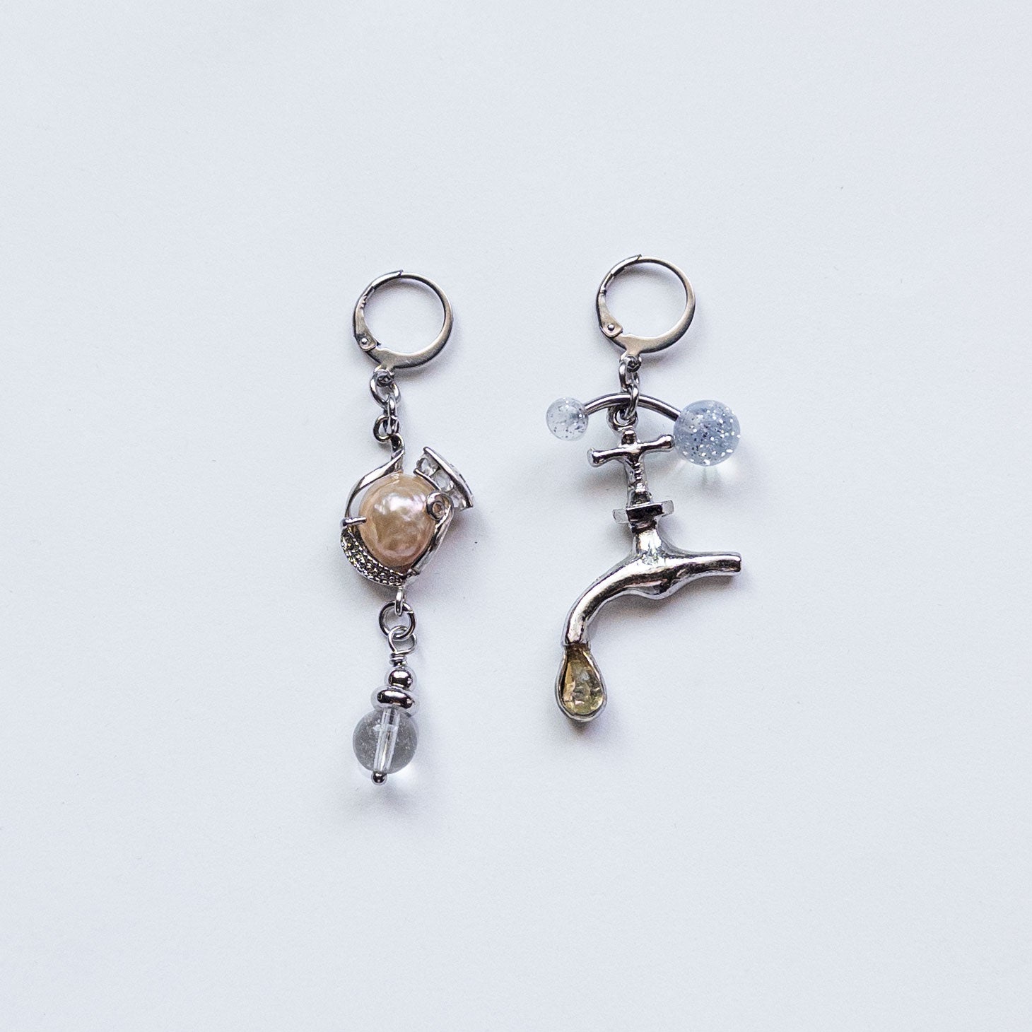 mixed metal earrings with faucet charm and freshwater pearl