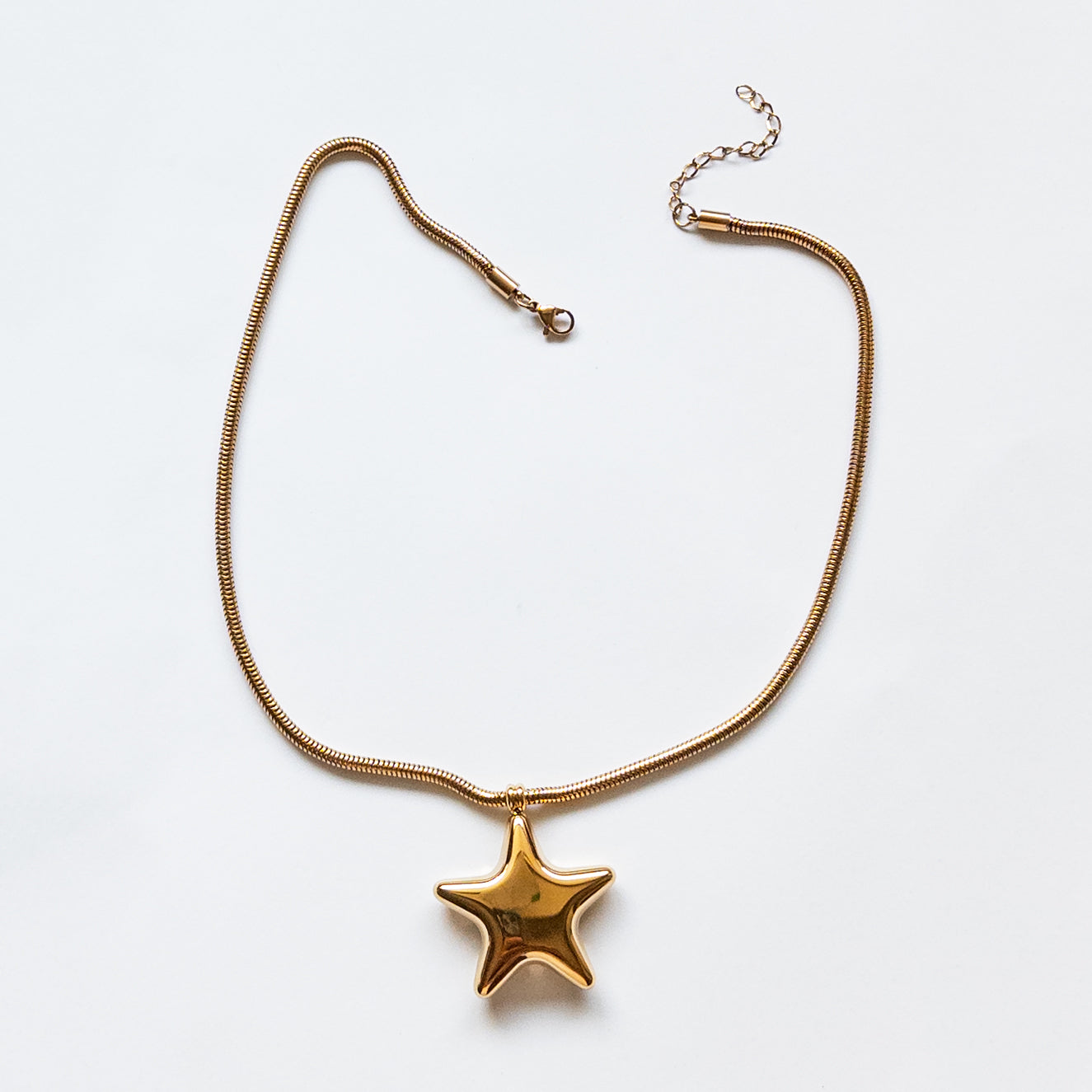 18k gold-plated stainless steel puffy star pendant on a thick snake chain necklace