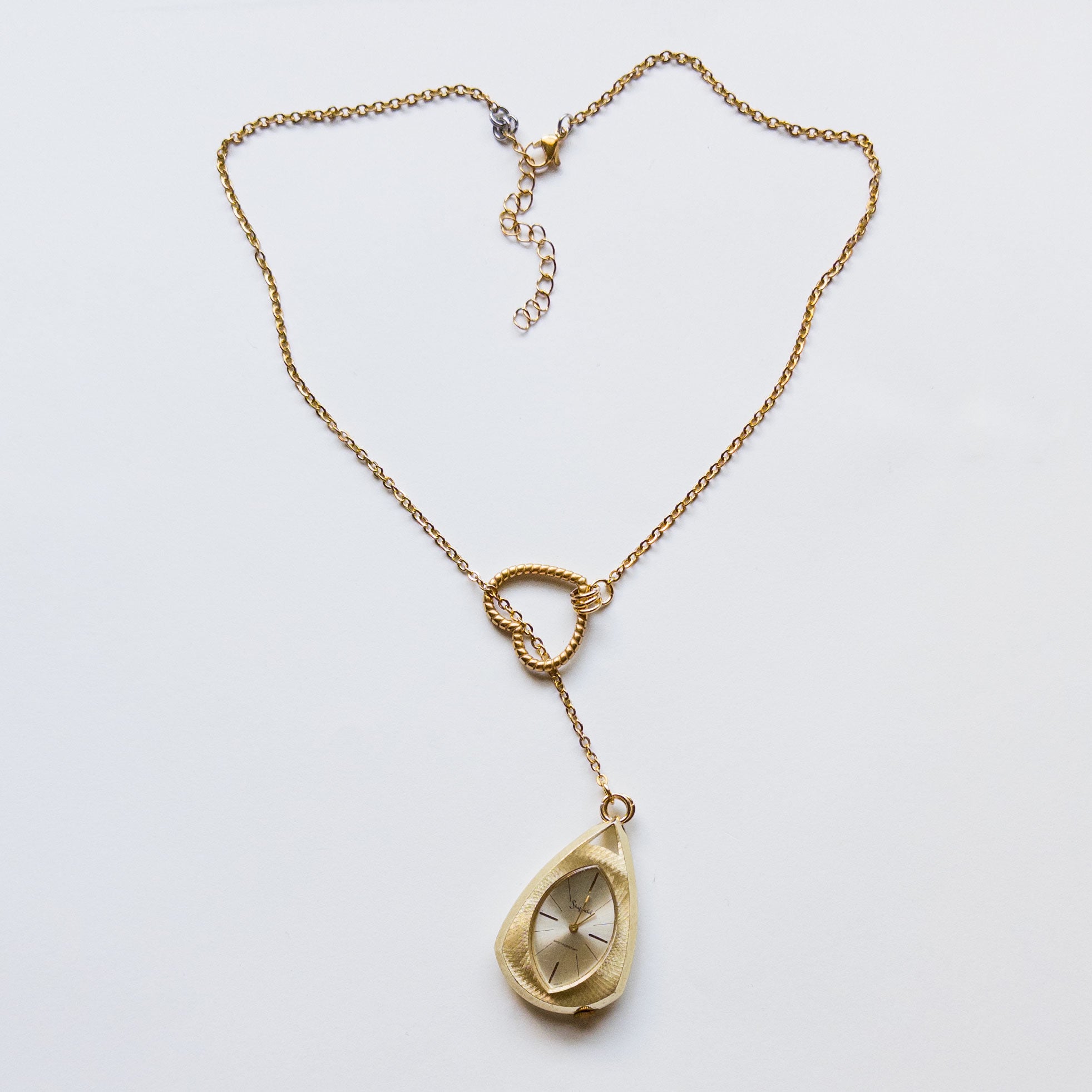 vintage watch necklace with heart detail
