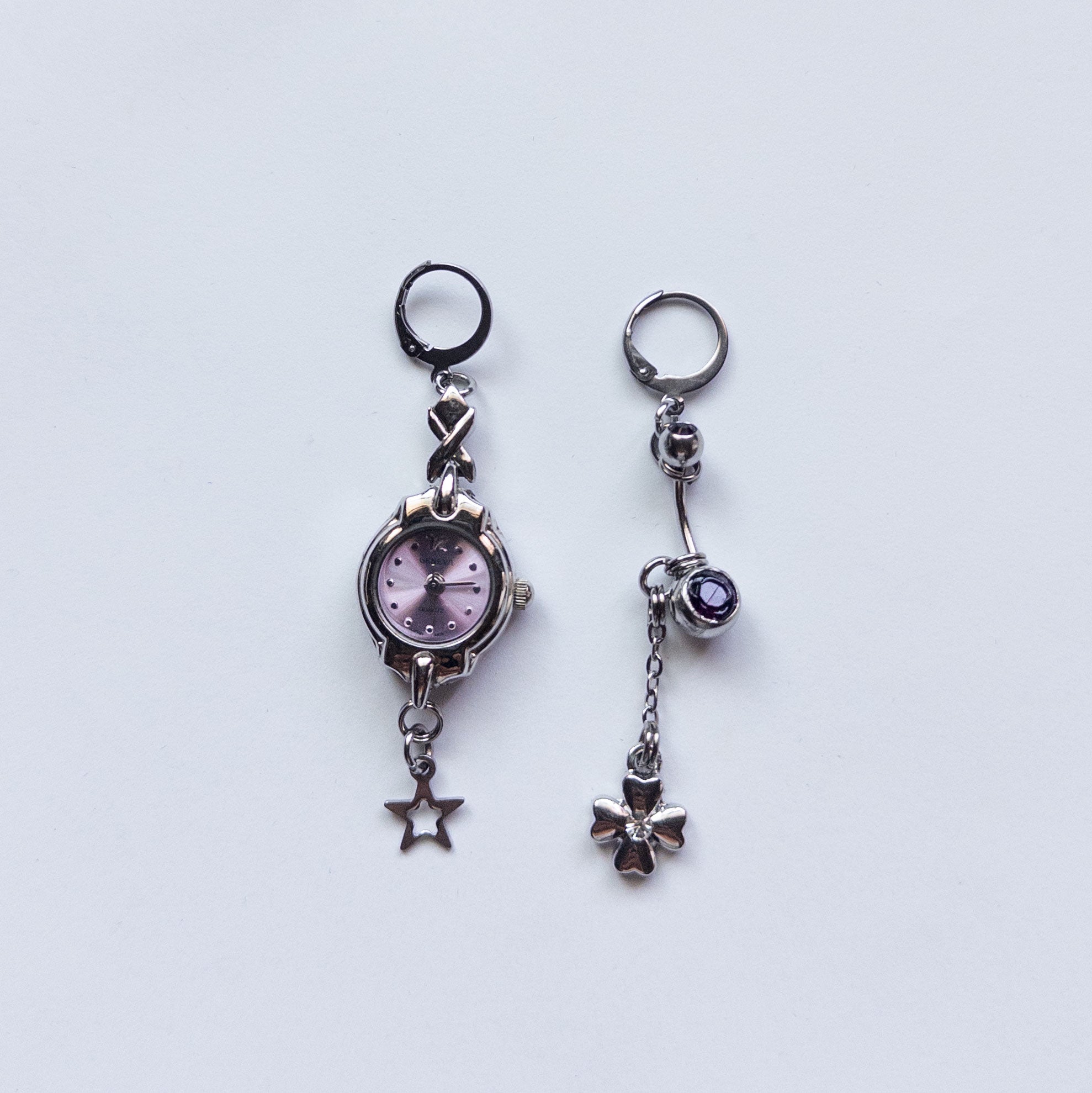 mixed metal earrings with vintage watch and star charms