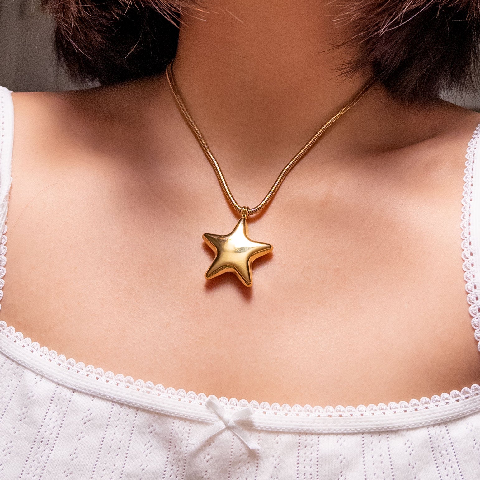 18k gold-plated stainless steel puffy star pendant on a thick snake chain necklace